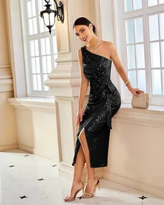 Elegant one-shoulder black sequin dress with side slit for cocktail parties.