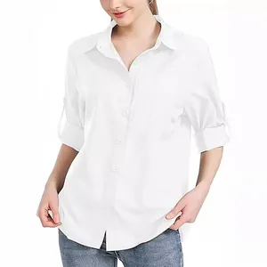 Vista detallada de camisa blanca con botones para mujer y mangas largas ajustables