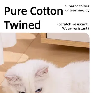 Detail view of durable cotton cat toy ball with vibrant macaron colors and plush texture