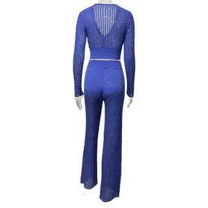 Back view detail of blue sheer knitted two-piece set with long sleeve top and flared pants