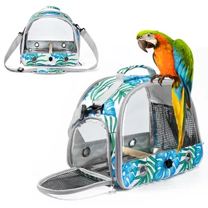 Sac à dos transport oiseaux avec motif feuilles tropicales et fenêtre transparente.