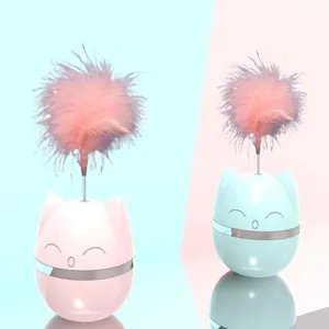 Detailed view of cat-shaped tumbler toys featuring colorful pink feather teasers