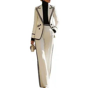 Elegant white double-breasted blazer and matching wide-leg trousers suit with black trim