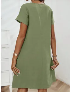Back view of a summer cotton linen short sleeve dress in olive green with pockets