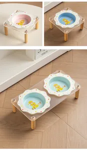 Detailed view of ceramic flower pet bowl with acrylic stand and wooden legs