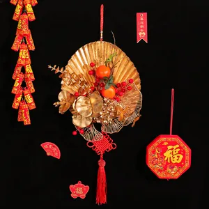 Festive 2026 Chinese New Year hanging decoration with golden fan, red berries and tassels