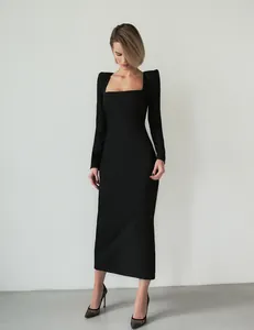 Elegant French style black long-sleeve midi dress featuring square neck and padded shoulders