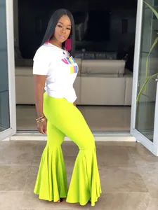 Pantalones de campana sexy verde lima de corte entallado con dobladillo con volantes