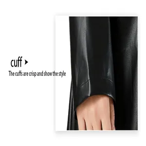 Macro detail view of the crisp sleeve cuff on a stylish black faux leather trench coat
