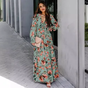 Elegant floral print long sleeve maxi dress for women in soft teal green with v-neckline detail