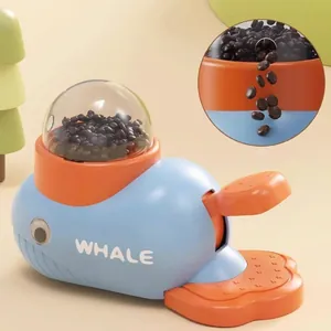 Whale-shaped interactive pet feeder toy for cats and dogs, slow food dispenser