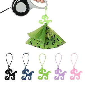 Portable hands-free dog waste bag holder clip for leash attachment in multiple colors