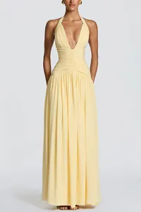 Elegant yellow floor-length maxi dress with deep V-neck and stylish halter strap design