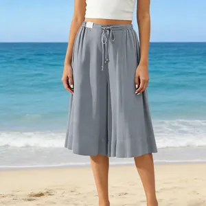 Casual wide-leg culottes with drawstring waist in muted blue for beach wear