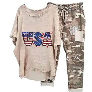 Detailed view of women's casual two-piece set with USA print top and camo pants