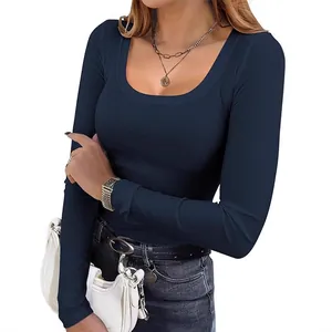 Close-up detail of women's navy blue ribbed slim fit square neck long sleeve top