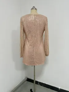 Back view of a sparkling sequin bodycon mini dress with lantern sleeves on a mannequin