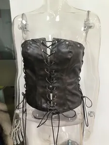Detail view of a vintage brown PU leather lace-up tube top on a clear mannequin