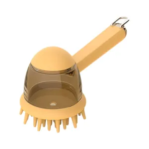 Yellow pet bath massage brush with soap dispenser and soft silicone bristles for dogs and cats