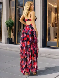 Floral print chiffon long dress featuring a stylish backless design and elegant ruffles