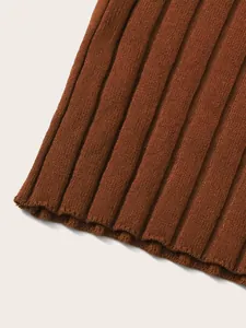 Close-up macro view showing the brown ribbed knit fabric texture of a women's tank top.