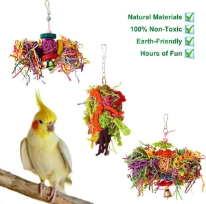 Detail view of 3pcs parrot chewing toys featuring natural vine balls and colorful paper.