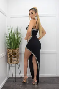 Sexy black spaghetti strap evening gown with rhinestones and a daring high side slit