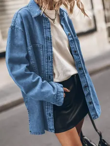 Detailed side view of an oversized vintage blue denim shirt with large utility pockets