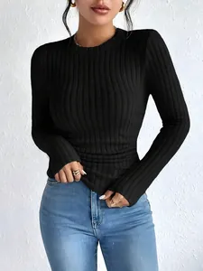 Detail shot of a women's black ribbed long sleeve crew neck t-shirt on a model