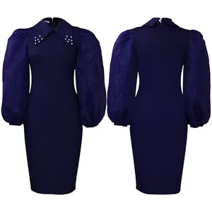 Front and back view of navy blue pencil dress with mesh puff sleeves and beaded collar