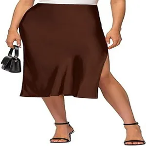Detail view of high waist brown satin midi skirt featuring an elegant side slit