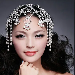 Detailed view of ornate pearl and rhinestone bridal headpiece made with 10mm ABS beads