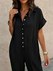 Casual black short sleeve button-up jumpsuit with shirt collar and loose fit design.
