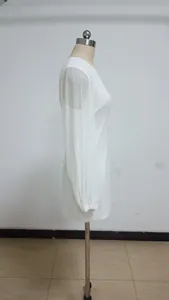 Side profile view of a white sequined bodycon dress with elegant lantern sleeves style