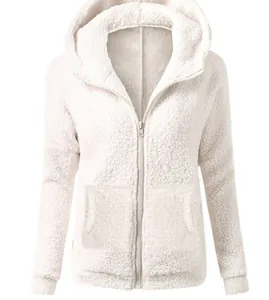Close-up view of a white fuzzy fleece zip-up hoodie featuring front pockets and hood