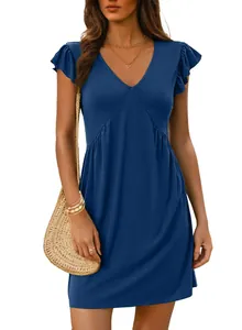 Close-up detail of blue V-neck dress featuring feminine ruffle cap sleeves and pleated waist.