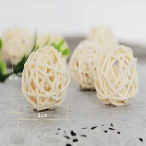 Detail shot of a 3cm diameter natural woven rattan ball toy for parrots and birds