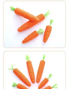 Vista detallada de juguetes para gatos en forma de zanahoria de cuerda de papel naranja.