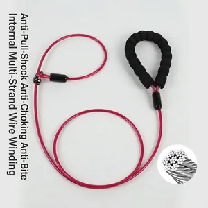 Detail view of heavy duty red dog leash featuring steel wire core and soft foam handle
