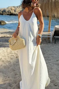 Elegant white sleeveless backless slip maxi dress perfect for summer beach vacations