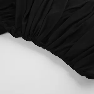 Detailed close-up showing the ruched texture of this sheer black mesh slim shirt