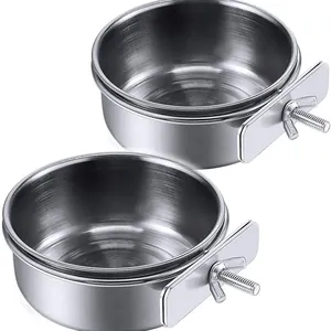 Set of two durable stainless steel bird food bowls with secure clamps for parrots