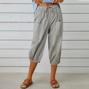 Women's casual cropped cotton linen pants with drawstring waist and button hem details