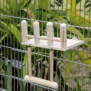 Detailed view showing the solid wood parrot perch and swing assembly inside a cage