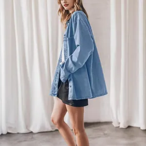 Side view of a vintage oversized light blue denim shirt with large pockets