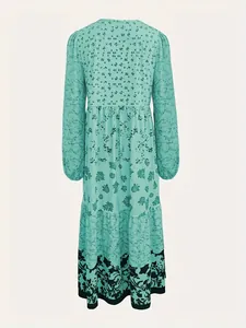 Back view of mint green long sleeve floral print dress with crew neck design for women