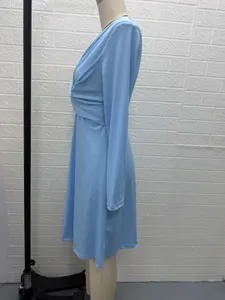 Detailed side view of a light blue V-neck pleated long sleeve midi dress for women
