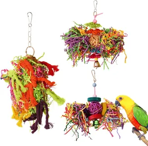 Set of 3 colorful parrot chewing toys with rattan balls and paper shreds for bird cages.
