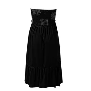 Back view of a chic black strapless maxi dress featuring a shirred bodice with script print.