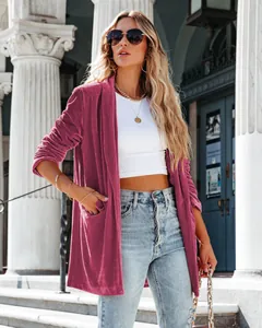 Elegant women's magenta velvet long sleeve open blazer jacket styled for casual wear.